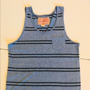 Men’s tank top light blue color with stripes.